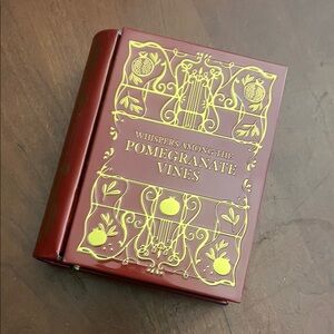 Red and Gold pomegranate vines candle Book Box from Barnes and Noble